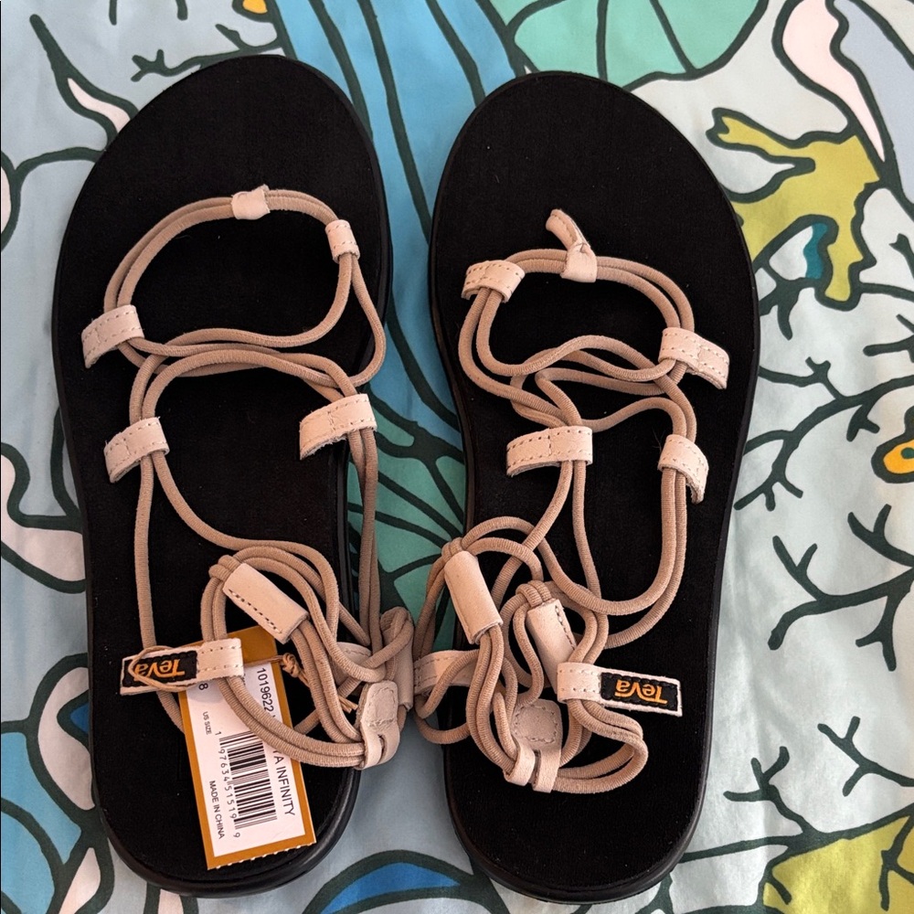 Teva Women's Black and Cream Strappy Sandals